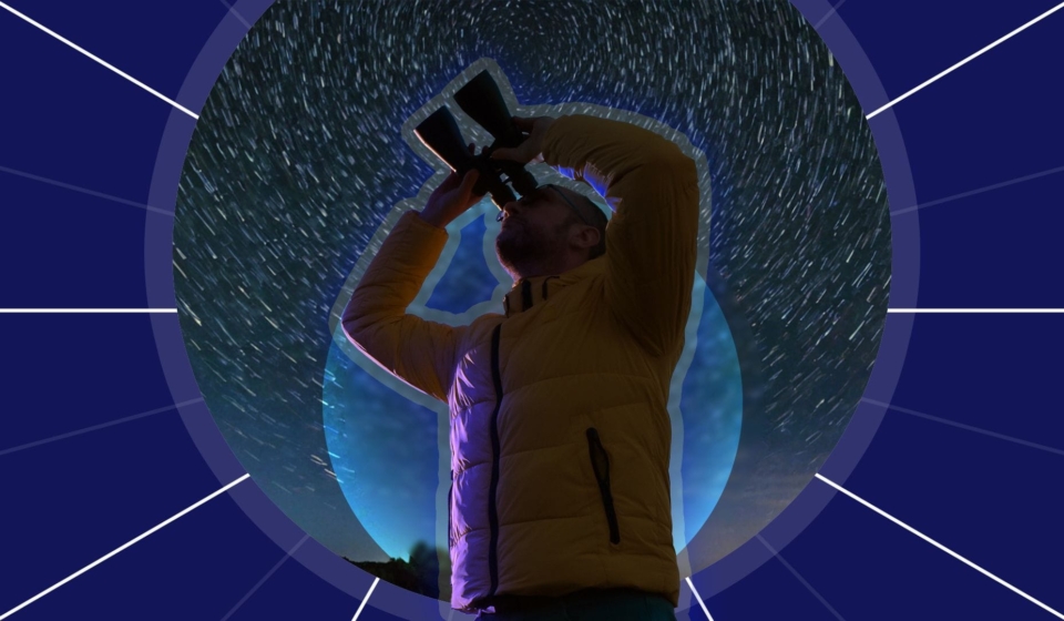 a-man-on-a-starry-night-using-binoculars.jpg