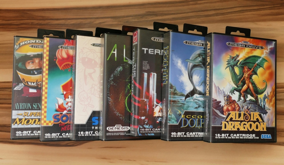 a row of nintendo games sitting on top of a wooden shelf